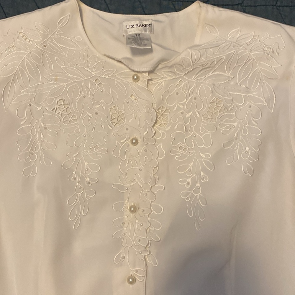 White floral and pearl accent blouse